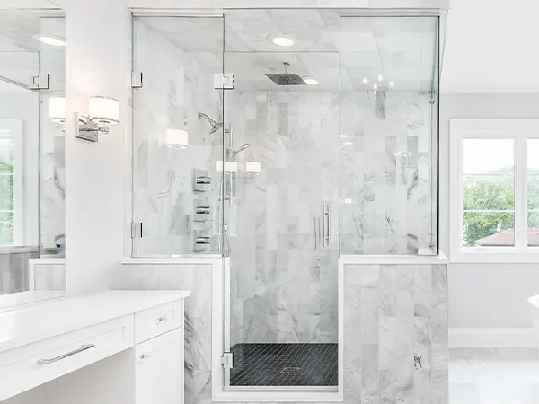 A shower in a white bathroom