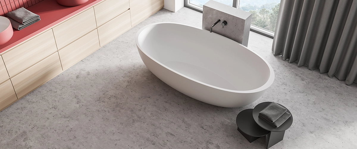 A bathroom flooring with a free standing tub