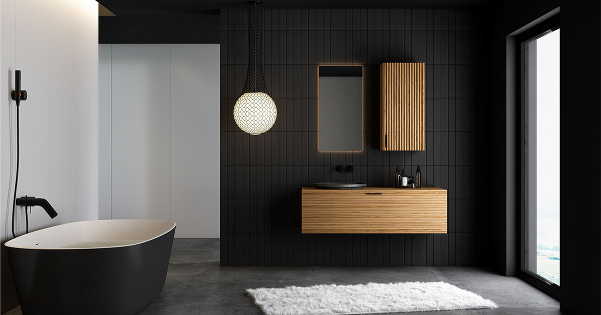 A dark bath with a wood cabinet and a simple wood vanity