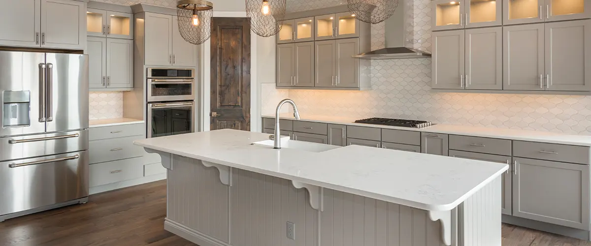 simple kitchen with beige cabinets