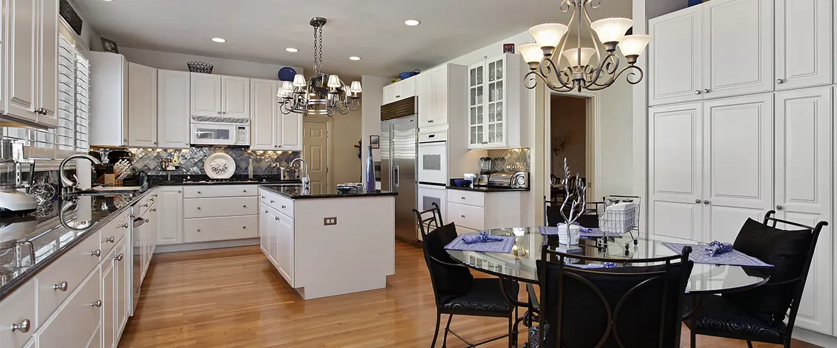 large open space kitchen with white cabinets