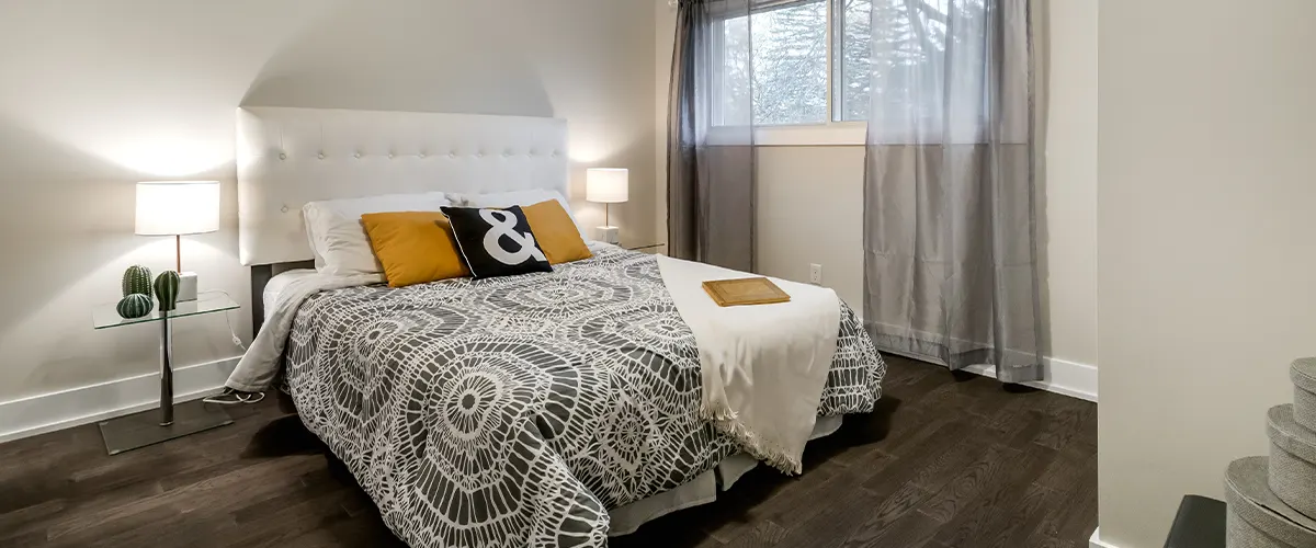 simple bedroom with wood flooring