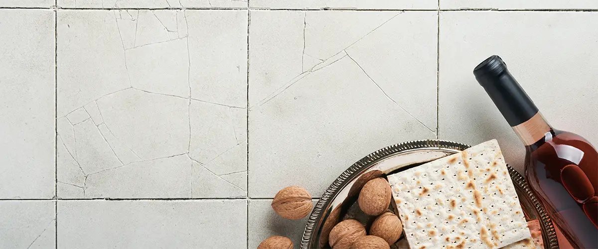 Tile countertop with bottle of wine and nuts